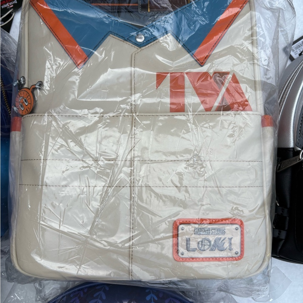 Loungefly Cream and Orange Backpack
